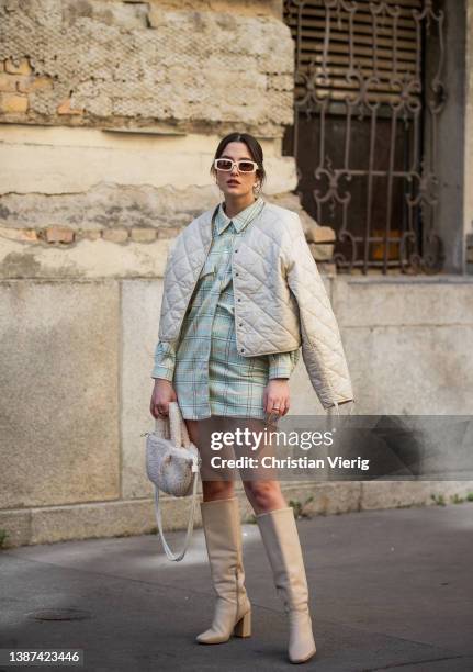 Gina Pásztor is seen wearing Co-ord : Reserved, Boots: LeGer, Bag: LegerSunglasses: Meller on March 23, 2022 in Budapest, Hungary.