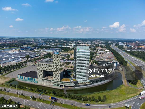 ijsseltoren office building along the a28 higway in zwolle - zwolle stock pictures, royalty-free photos & images