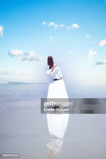 whirling dervish over the lake - nature one festival 2013 stockfoto's en -beelden