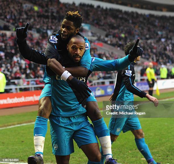 Thierry Henry of Arsenal celebrates scoring to make it 2-1 with Alexandre Song during the Barclays Premier League match between Sunderland and...