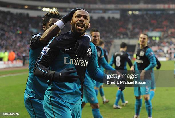 Thierry Henry of Arsenal celebrates scoring to make it 2-1 with Alexandre Song during the Barclays Premier League match between Sunderland and...