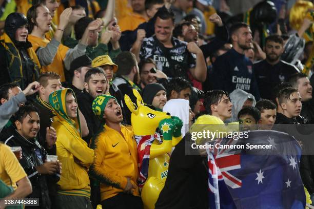 Fans cheer during the FIFA World Cup Qatar 2022 AFC Asian Qualifying match between the Australia Socceroos and Japan at Accor Stadium on March 24,...