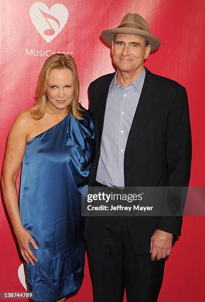 James Taylor and Kim Smedvig arrives at The 2012 MusiCares Person of The Year Gala Honoring Paul McCartney at Los Angeles Convention Center on...