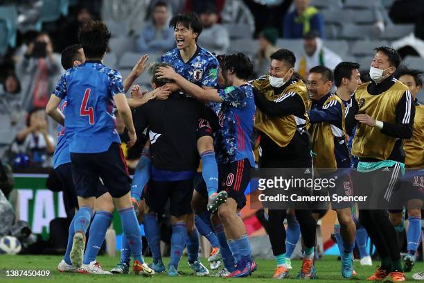 Kaoru Mitoma of Japan celebrates a goal with team mates during the FIFA World Cup Qatar 2022 AFC Asian Qualifying match between the Australia...