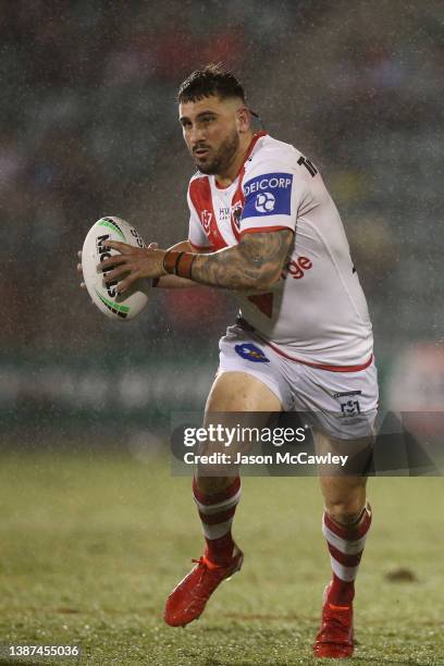 Jack Bird of the Dragons runs the ball during the round three NRL match between the St George Illawarra Dragons and the Cronulla Sharks at WIN...