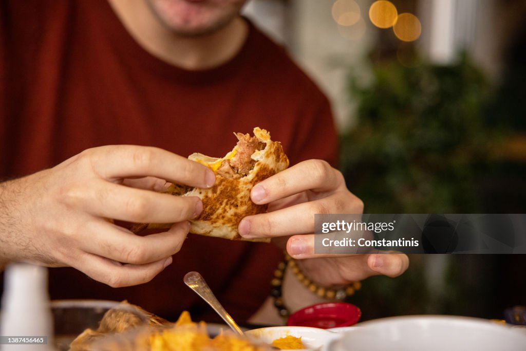 Boy having a burrito