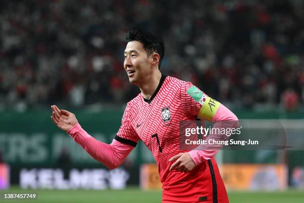 Son Heung-Min of South Korea celebrates after scoring team's first goal during the FIFA World Cup Asian Qualifier Final Round Group A match between...