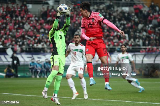 Hwang Ui-Jo of South Korea competes for the ball with Amir Abed Zadeh of Iran during the FIFA World Cup Asian Qualifier Final Round Group A match...