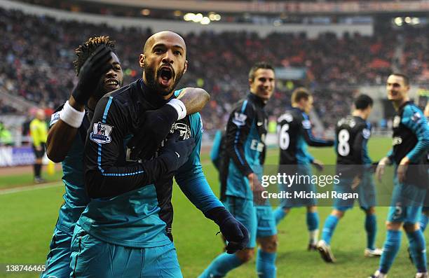 Thierry Henry of Arsenal celebrates scoring to make it 2-1 with Alex Song during the Barclays Premier League match between Sunderland and Arsenal at...