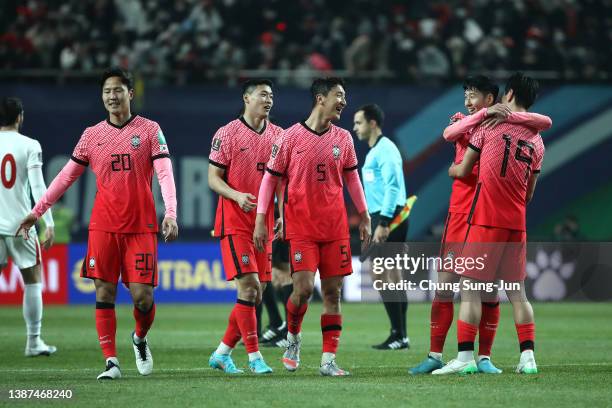 Son Heung-Min of South Korea celebrates with team mates after the FIFA World Cup Asian Qualifier Final Round Group A match between South Korea and...