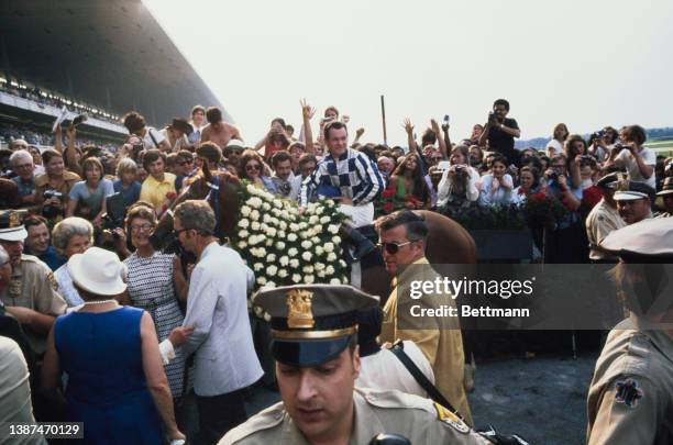 Canadian jockey Ron Turcotte riding Secretariat into the Winner's Circle after winning the Belmont Stakes at Belmont Park in Elmont, New York, 9th...