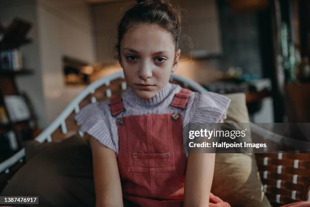 sad teenage girl crying and looking at camera at home. - anxious looking to camera fotografías e imágenes de stock