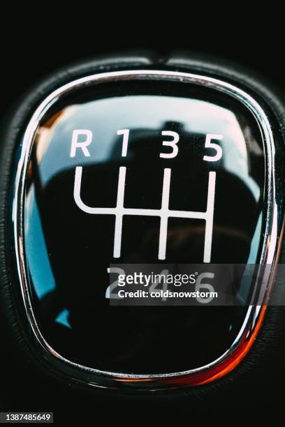 close up of top of gear stick in car interior - gears stick imagens e fotografias de stock