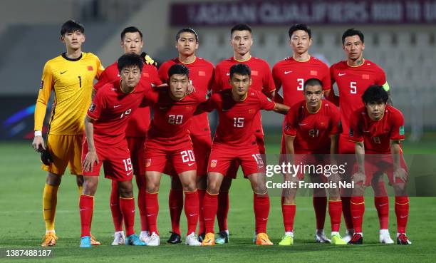 China poses for a team picture during the FIFA World Cup Asian Qualifying match between China v Saudi Arabia at Sharjah Football Stadium on March 24,...