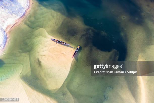 natural pattern of sea beach with boats,freetown,sierra leone - serra leoa - fotografias e filmes do acervo