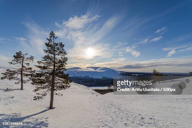 kesnki scenery,scenic view of snow covered landscape against sky,kolari,finland - arttu stock pictures, royalty-free photos & images