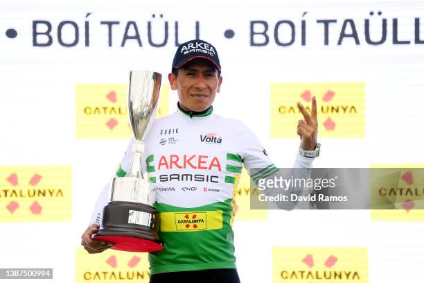 Nairo Alexander Quintana Rojas of Colombia and Team Arkéa - Samsic celebrates winning the Green Leader Jersey on the podium ceremony after the 101st...