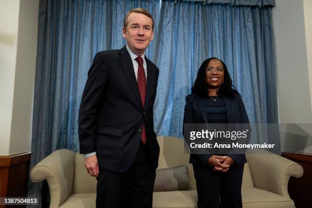 Supreme Court nominee Judge Ketanji Brown Jackson poses for a photo with Sen. Michael Bennet before meeting in his office on March 24, 2022 in...