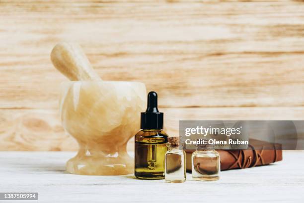 pestle in mortar, cbd oil and soap. - pharmaceutical ingredient stock pictures, royalty-free photos & images