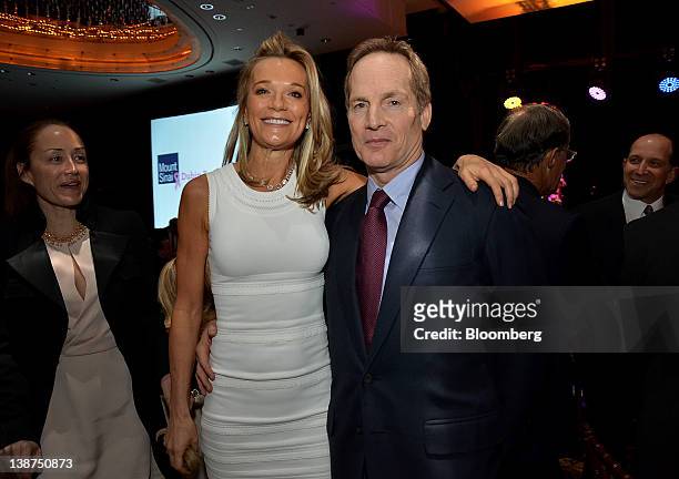 Glenn Dubin, chairman and chief executive officer of Highbridge Capital Management LLC, right, and Dr. Eva Andersson-Dubin, internist at National...