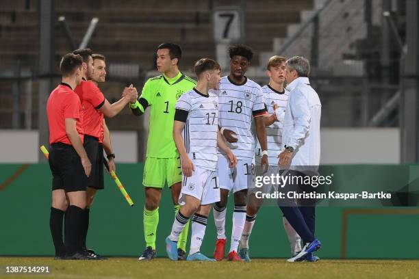 Uche Destiny Obiogumu of Germany, Brajan Gruda of Germany and Mio Backhaus of Germany react after the international friendly match between Germany...