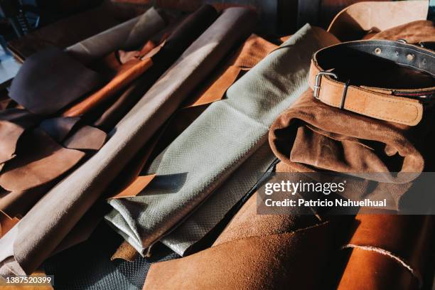 sheets and remnants of leather in different colors. - leather craft stock pictures, royalty-free photos & images