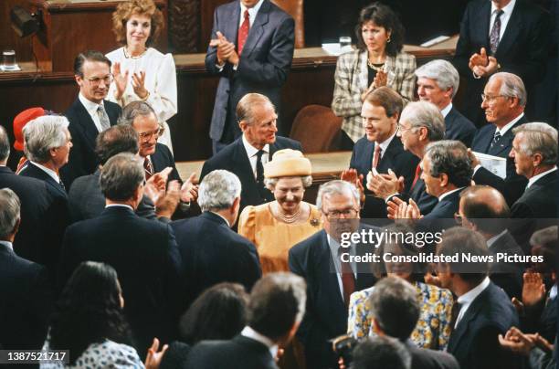 Sergeant at Arms to the Senate Martha S Pope and Doorkeeper of the House of Representatives James Thomas Molloy escort British monarch Queen...