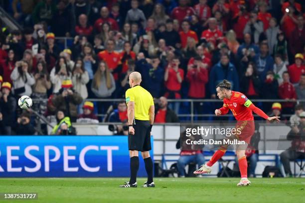 Gareth Bale of Wales scores their team's first goal from a free kick during the 2022 FIFA World Cup Qualifier knockout round play-off match between...