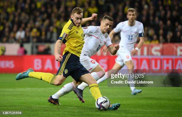Dejan Kulusevski of Sweden shoots whilst under pressure from Tomas Holes of Czech Republic during the 2022 FIFA World Cup Qualifier knockout round...