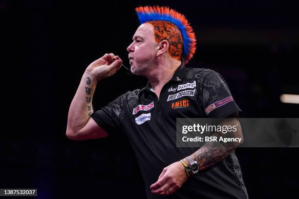 Peter Wright of Scotland competes against James Wade of England during day seven of the 2022 Cazoo Premier League at Ahoy on March 24, 2022 in...