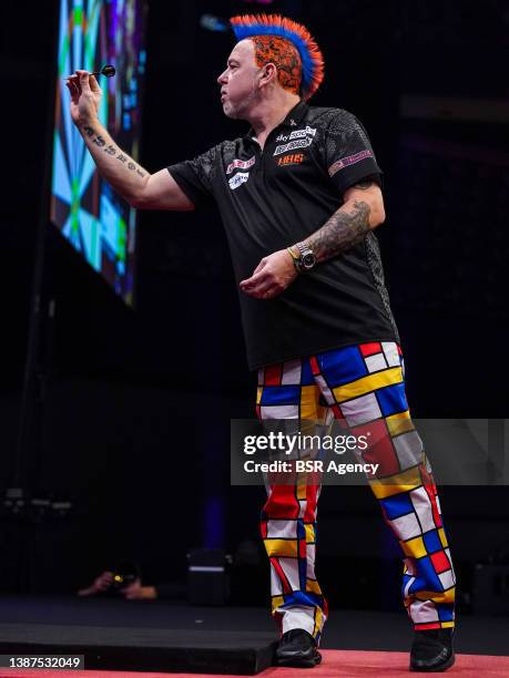 Peter Wright of Scotland competes against James Wade of England during day seven of the 2022 Cazoo Premier League at Ahoy on March 24, 2022 in...