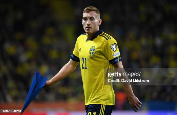 Dejan Kulusevski of Sweden holds a paper aeroplane during the 2022 FIFA World Cup Qualifier knockout round play-off match between Sweden and Czech...