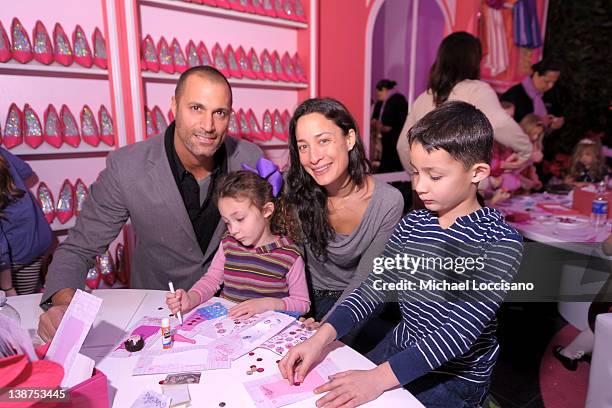 Nigel Barker and model Cristen Barker pose with their children Jasmine Ines Barker and Jack Barker during Barbie The Dream Closet Playdate Saturday...