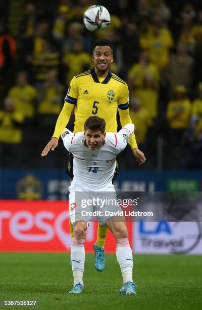 Martin Olsson of Sweden competes for a header with Lukas Masopust of Czech Republic during the 2022 FIFA World Cup Qualifier knockout round play-off...