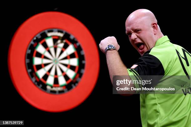 Michael 'Mighty Mike' van Gerwen of Netherlands celebrates as he competes against Michael 'Bully Boy' Smith of England during Night 7 of Cazoo...