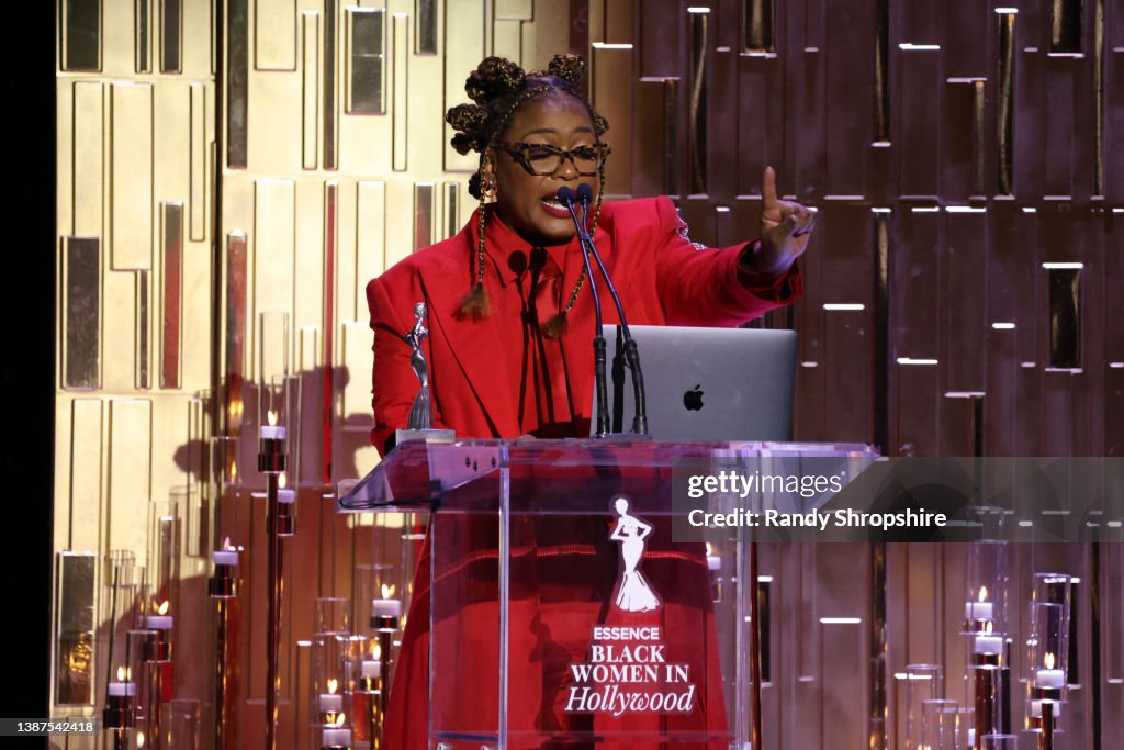 Honoree Aunjanue Ellis accepts an award onstage during the 2022 15th
