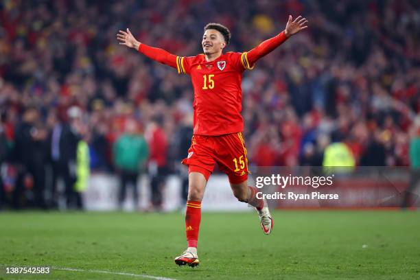 Ethan Ampadu of Wales celebrates following their side's victory in the 2022 FIFA World Cup Qualifier knockout round play-off match between Wales and...