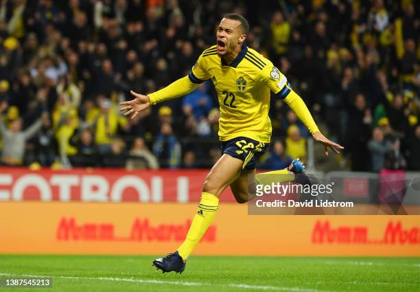 Robin Quaison of Sweden celebrates after scoring their side's first goal during the 2022 FIFA World Cup Qualifier knockout round play-off match...