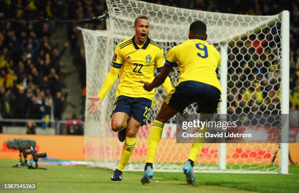 Robin Quaison of Sweden celebrates after scoring their side's first goal during the 2022 FIFA World Cup Qualifier knockout round play-off match...