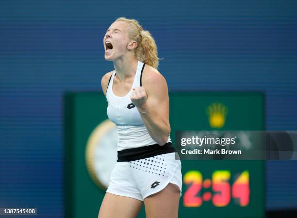 Kateřina Siniaková of Czechia reacts after defeating Emma Raducanu of United Kingdom in three sets during the 2022 Miami Open presented by Itaú at...