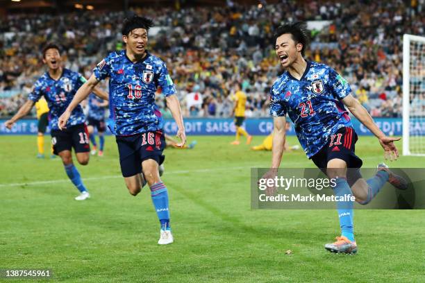 Kaoru Mitoma of Japan celebrates scoring a goal during the FIFA World Cup Qatar 2022 AFC Asian Qualifying match between the Australia Socceroos and...