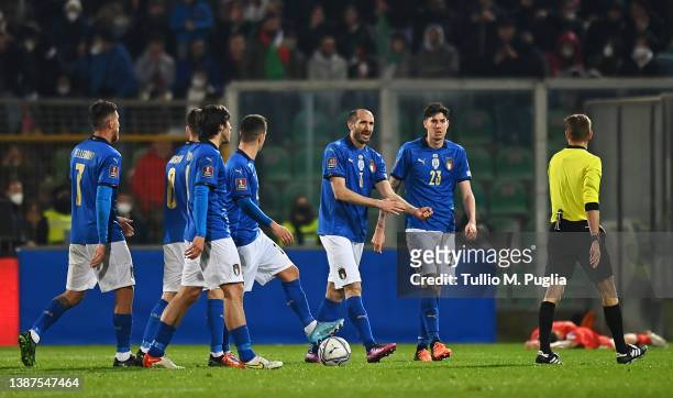 Giorgio Chiellini and Alessandro Bastoni of Italy react after conceding their side's first goal scored by Aleksandar Trajkovski of North Macedonia...