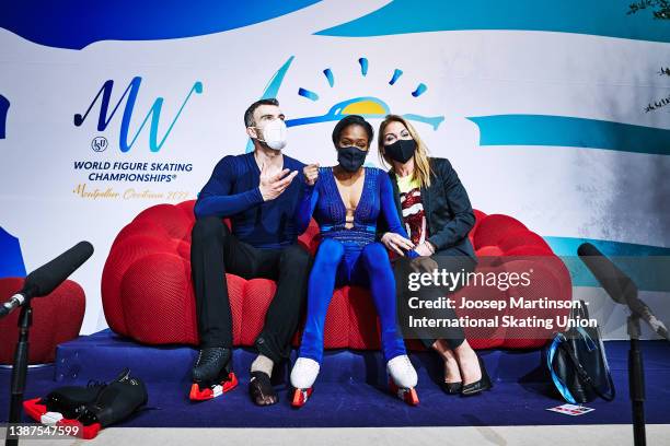 Vanessa James and Eric Radford of Canada react at the kiss and cry in the Pairs Free Skating during day 2 of the ISU World Figure Skating...