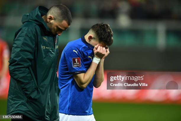 Giorgio Chiellini and Jorginho of Italy reacts at the end of the 2022 FIFA World Cup Qualifier knockout round play-off match between Italy and North...