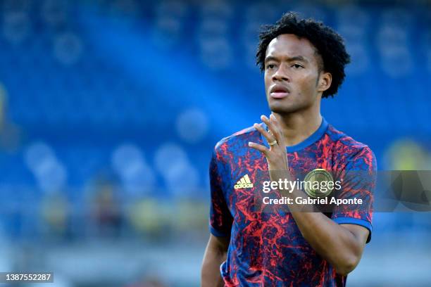 Juan Cuadrado of Colombia warms up prior to a match between Colombia and Bolivia as part of FIFA World Cup Qatar 2022 Qualifier on March 24, 2022 in...