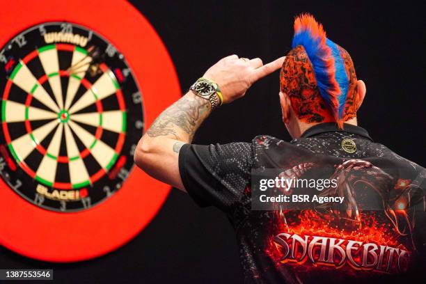 Peter Wright of Scotland competes against Joe Cullen of England during day seven of the 2022 Cazoo Premier League at Ahoy on March 24, 2022 in...