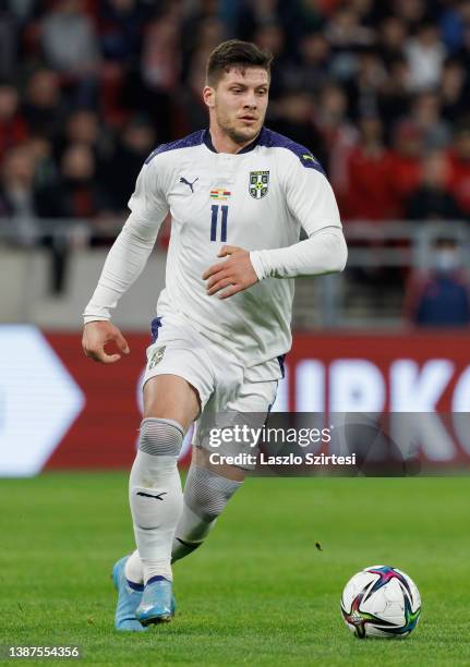 Luka Jovic of Serbia runs with the ball during the international friendly match between Hungary and Serbia at Puskas Arena on March 24, 2022 in...