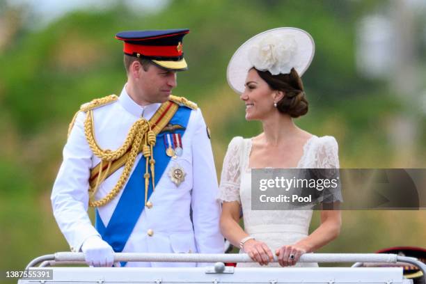 Catherine, Duchess of Cambridge and Prince William, Duke of Cambridge ride in a Land Rover as they attend the inaugural Commissioning Parade for...