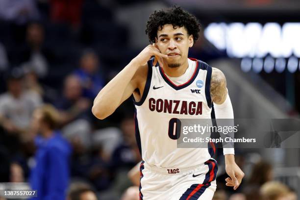 Julian Strawther of the Gonzaga Bulldogs reacts against the Arkansas Razorbacks during the first half in the Sweet Sixteen round game of the 2022...