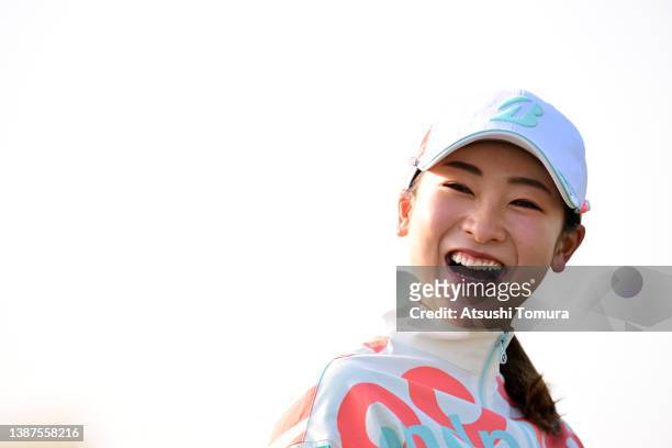Rei Matsuda of Japan smiles on the practice green during the first round of AXA Ladies Golf Tournament at UMK Country Club on March 25, 2022 in...